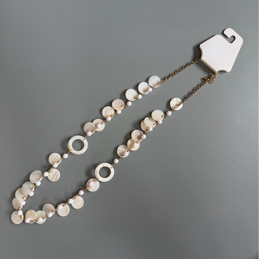 Elegant Cream Necklace with Gold Accents